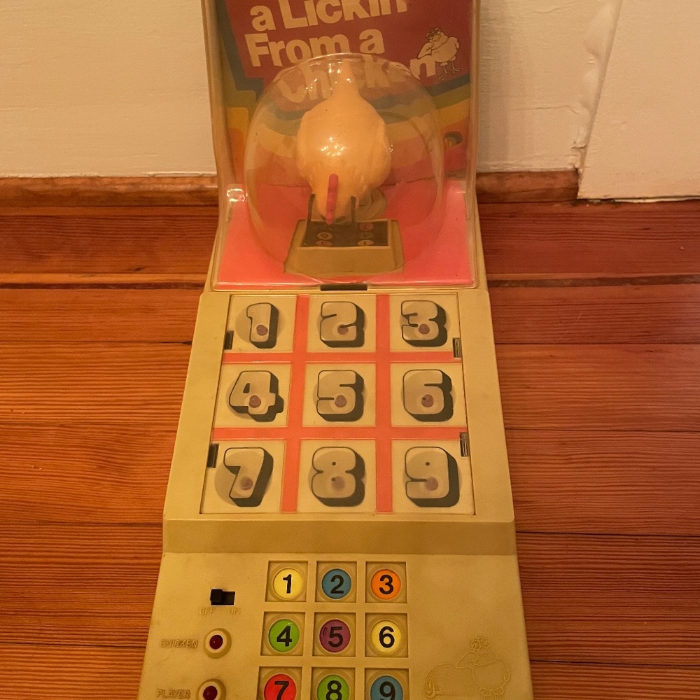 Vintage “I took a lickin from a chicken’” game